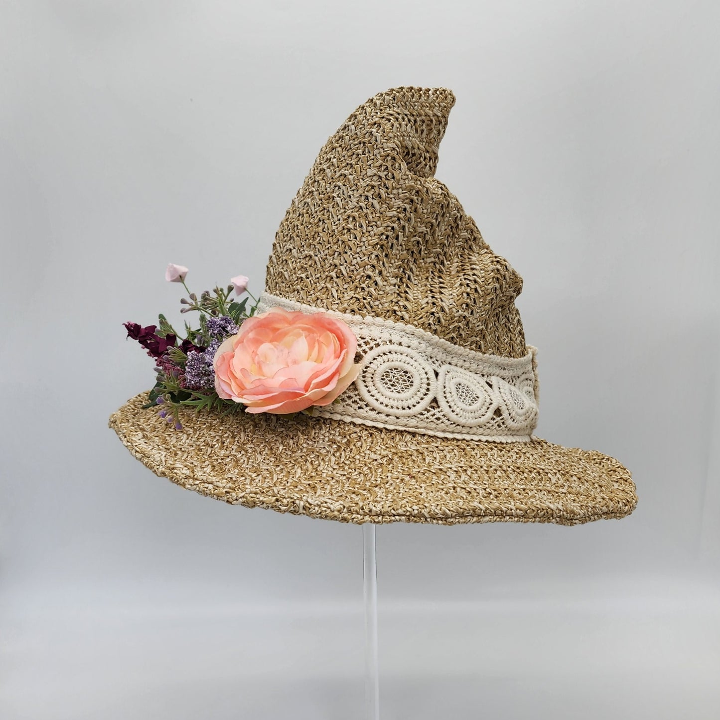S201- Straw witch hat with floral decoration