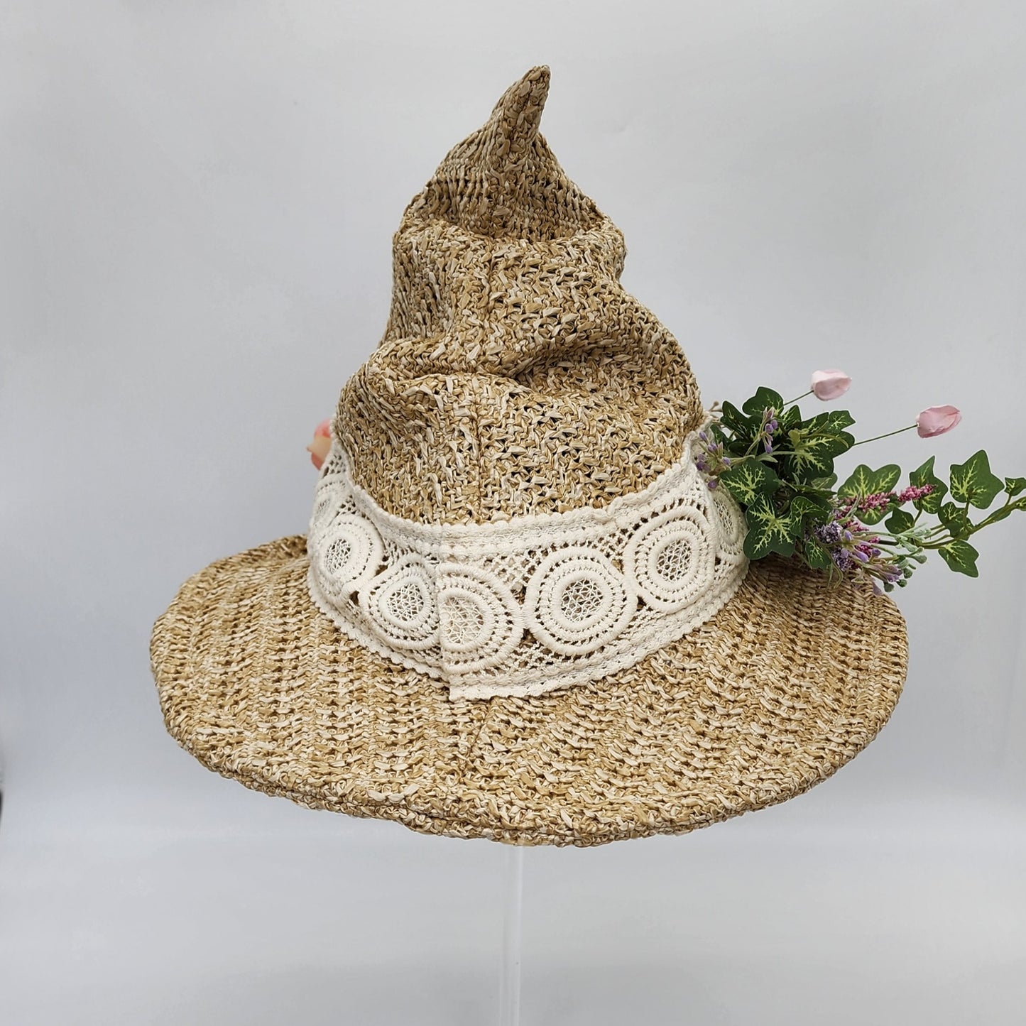 S201- Straw witch hat with floral decoration