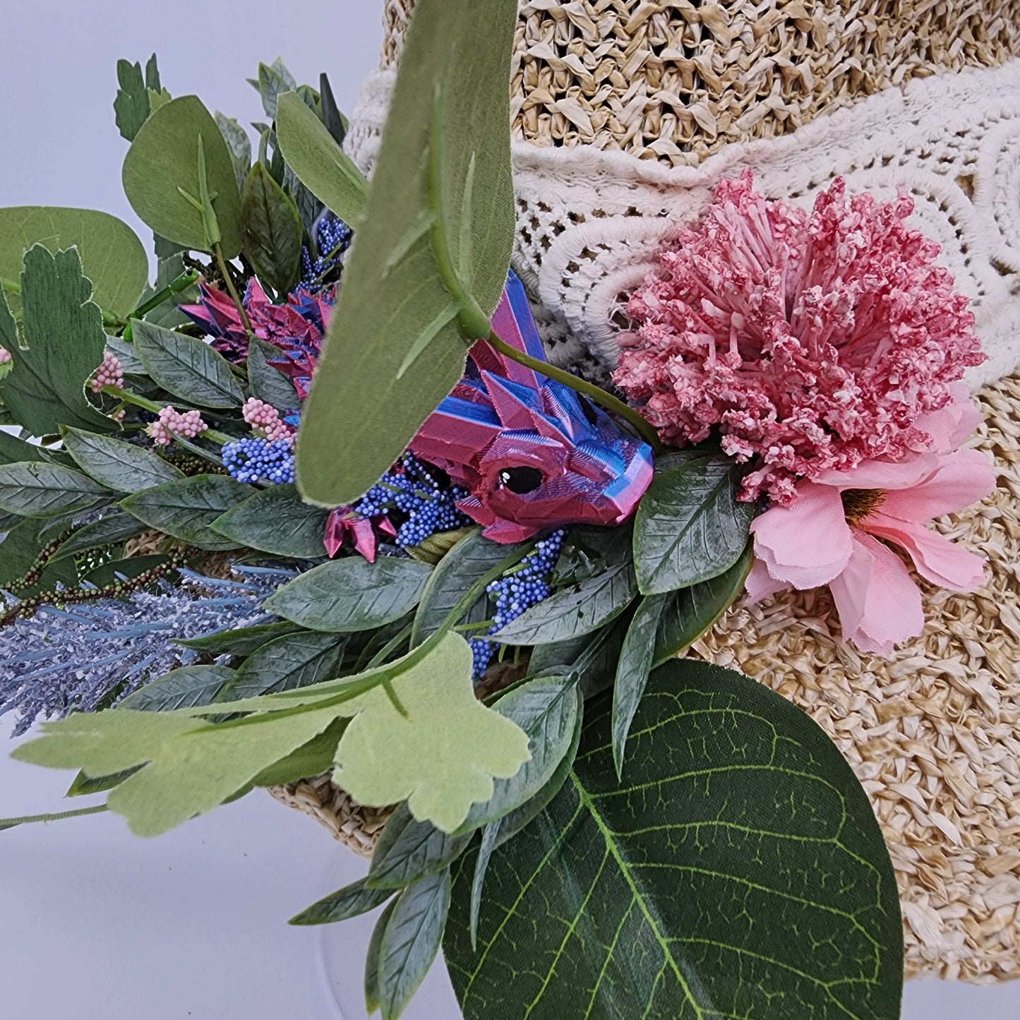 S203- Straw witch hat with floral dragon decoration