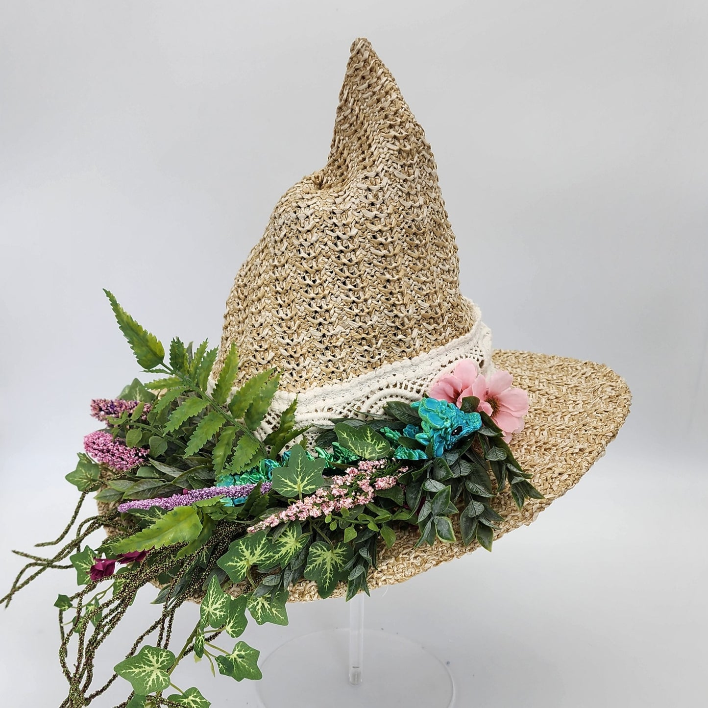 S204- Straw witch hat with floral dragon decoration