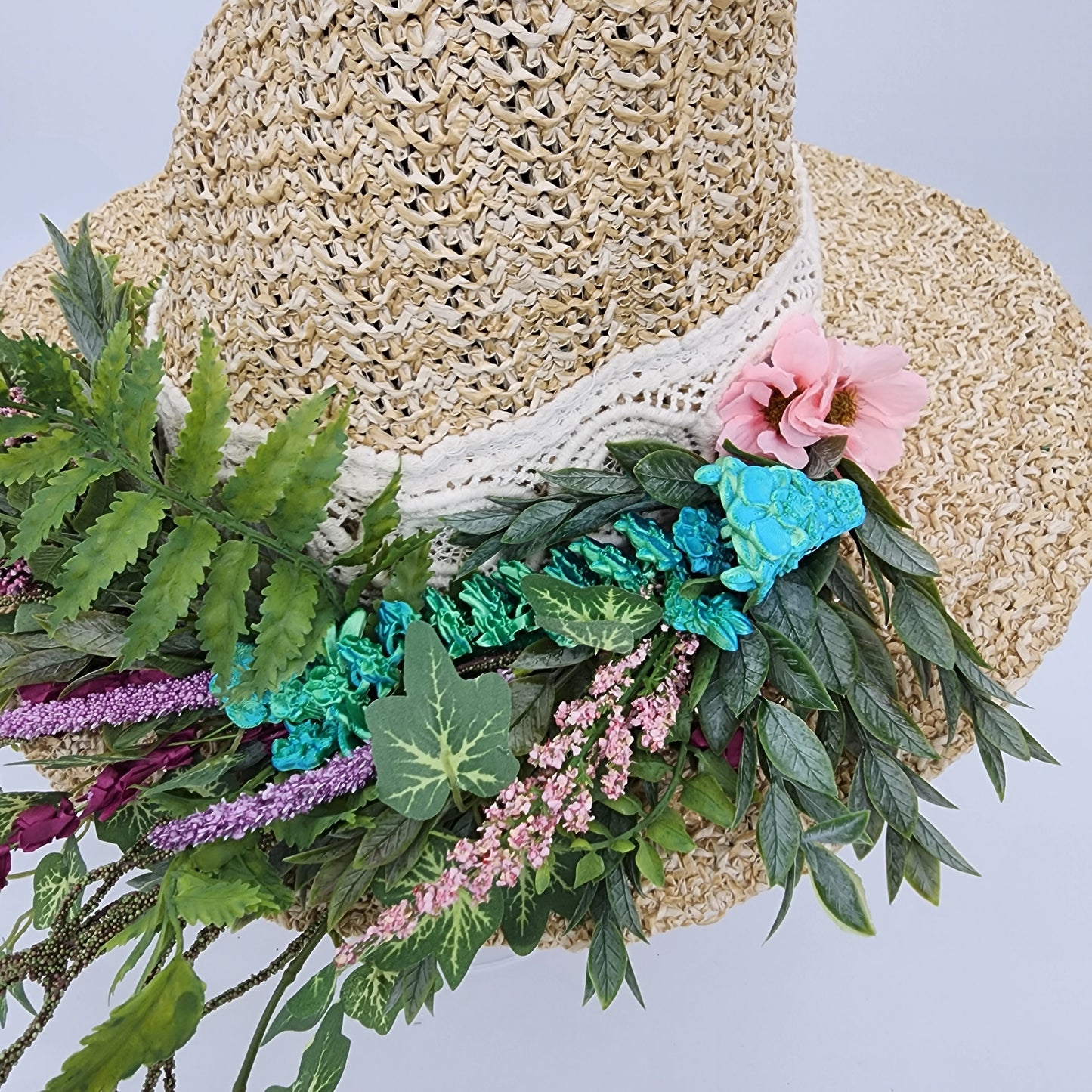 S204- Straw witch hat with floral dragon decoration