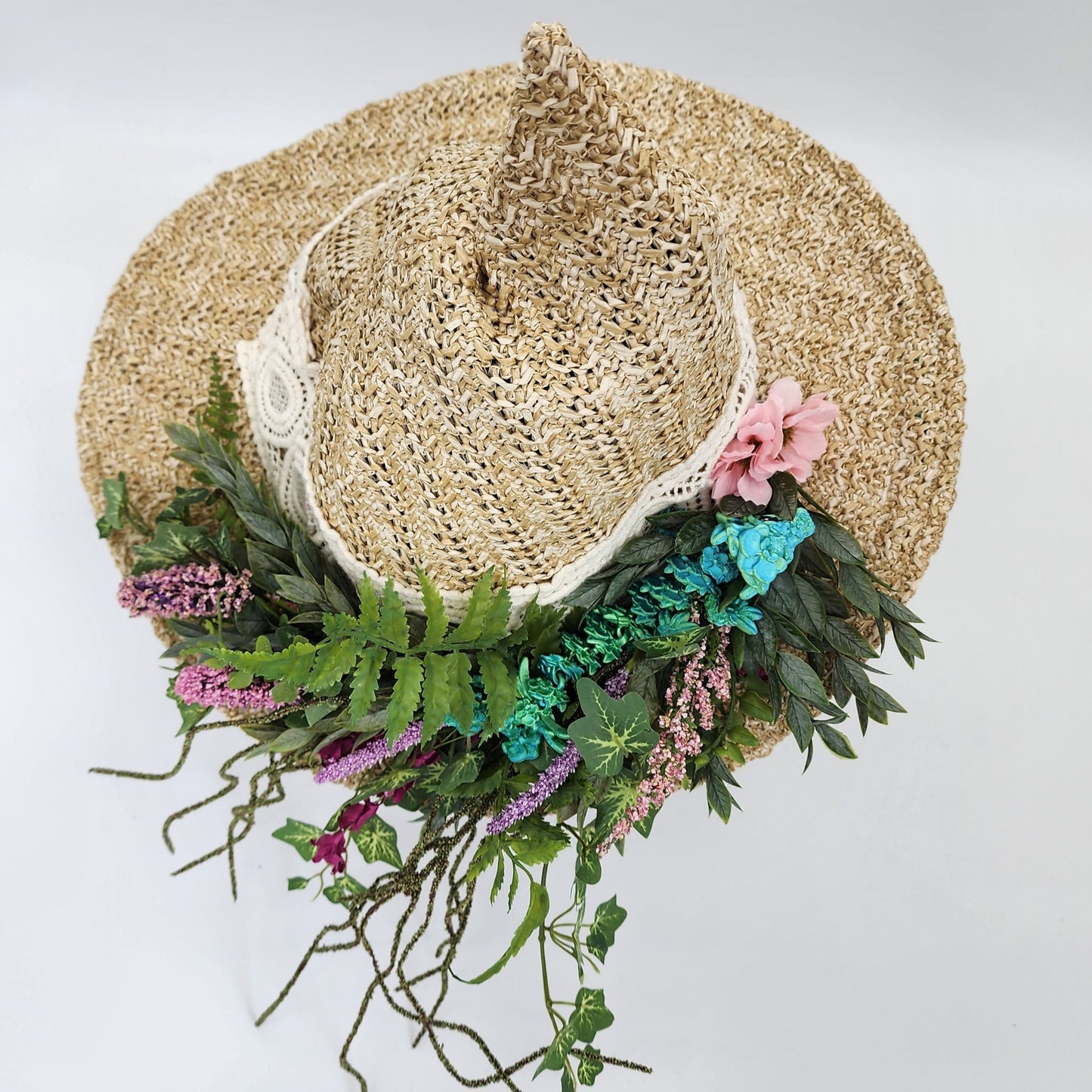 S204- Straw witch hat with floral dragon decoration