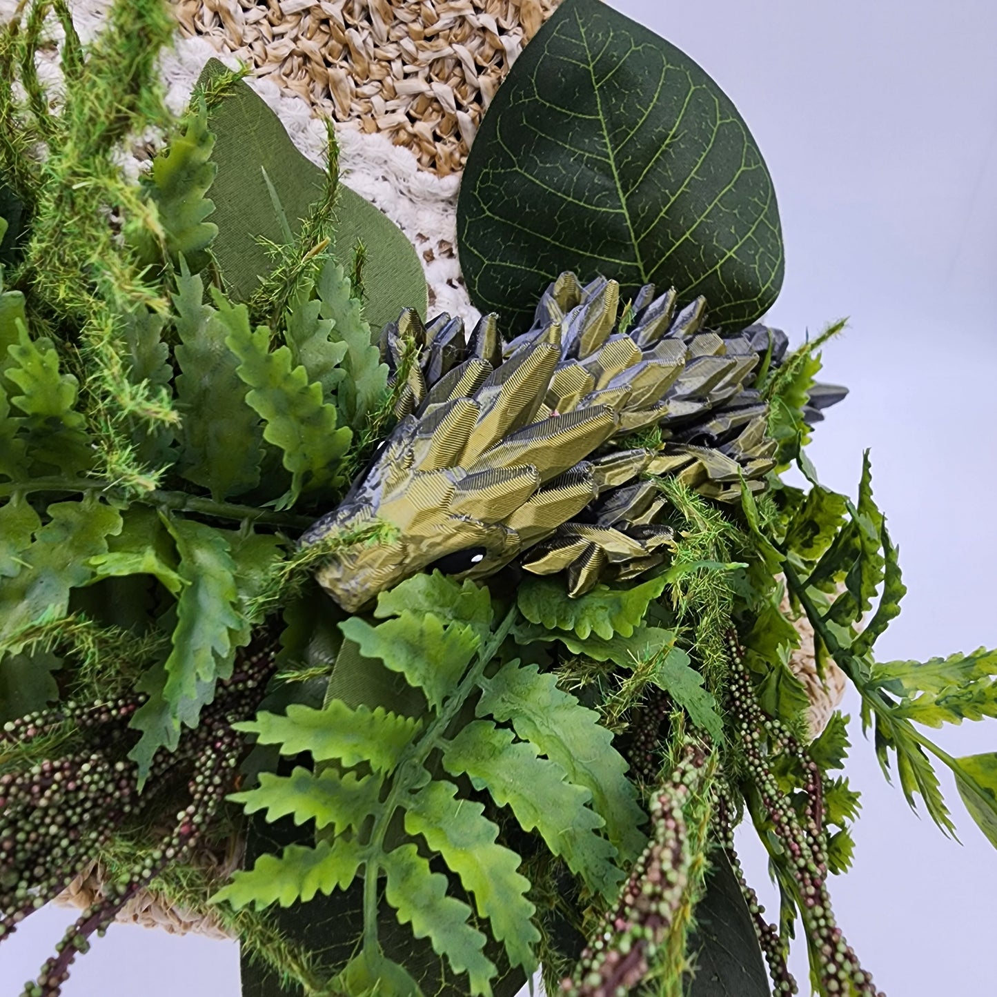 S205- Straw witch hat with floral dragon decoration