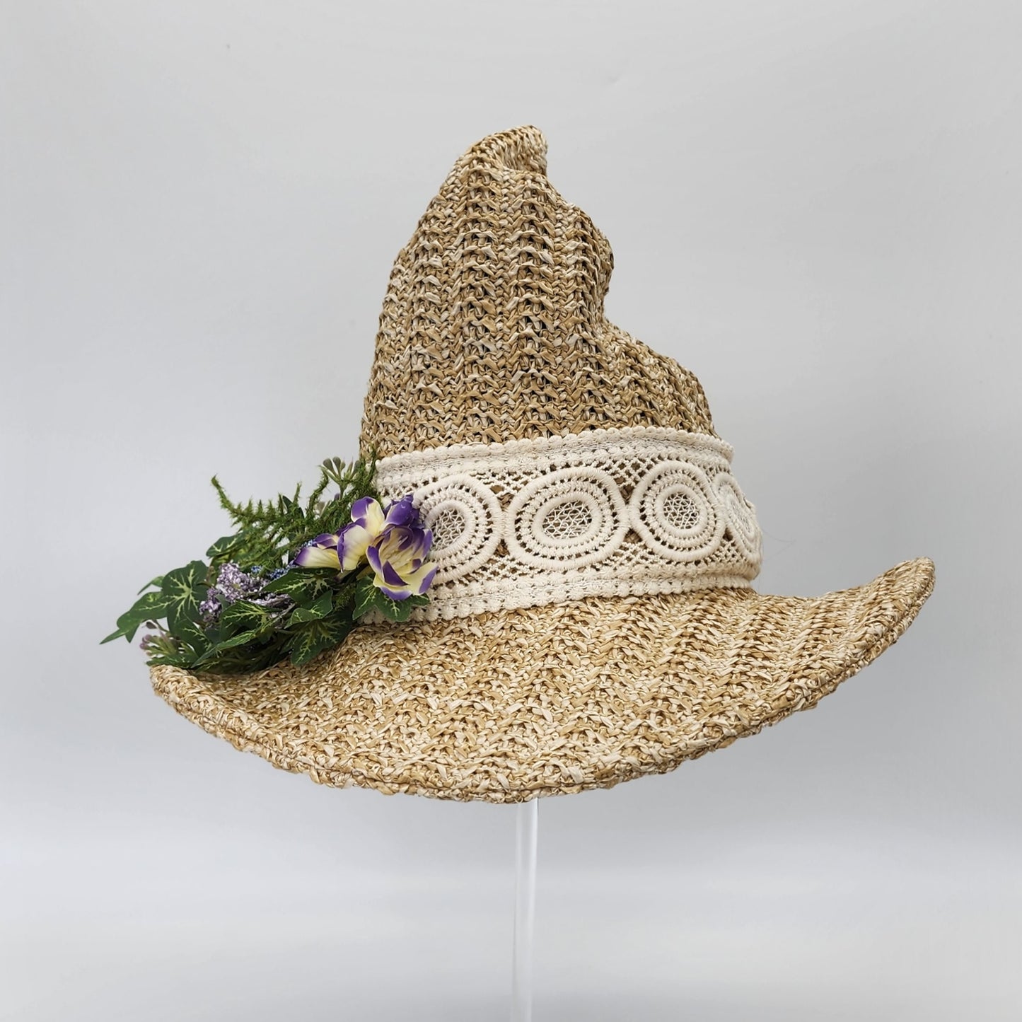 S206- Straw witch hat with floral decoration