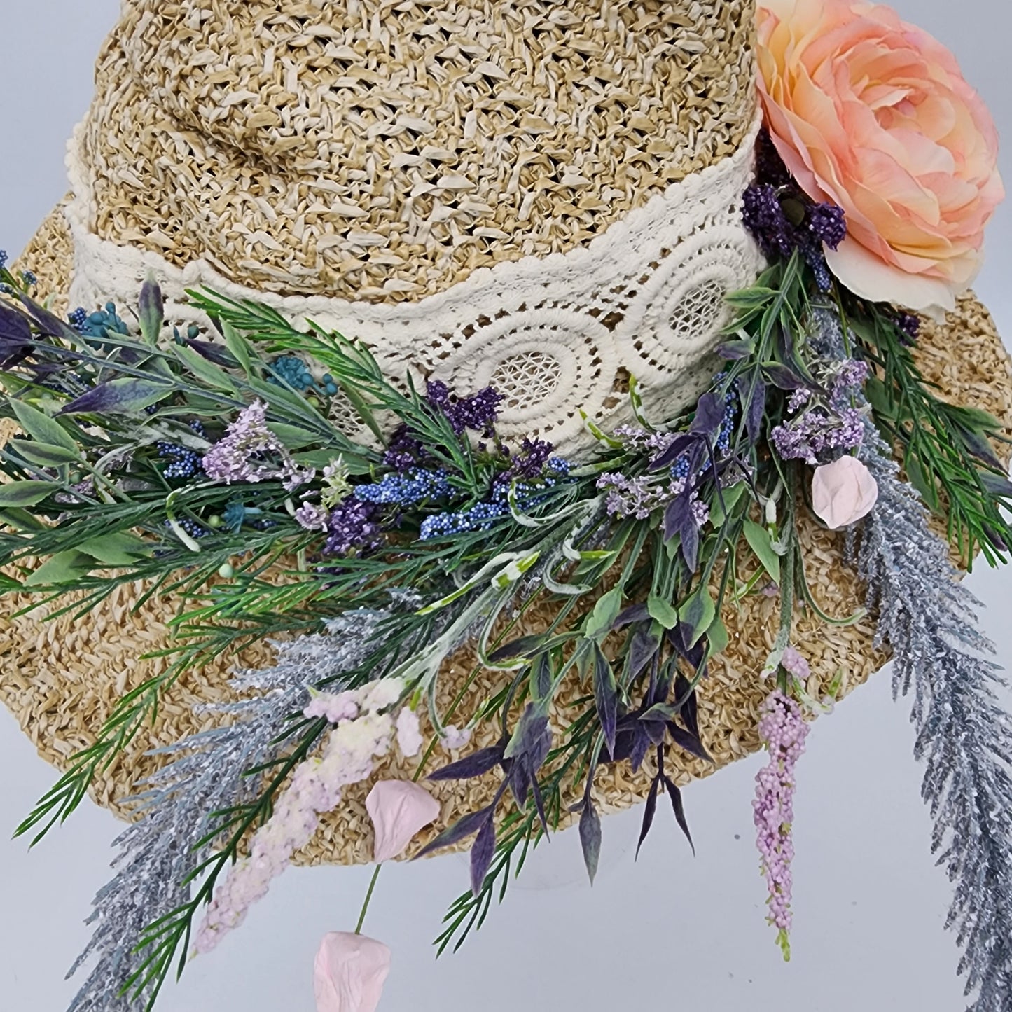 S207- Straw witch hat with floral decoration