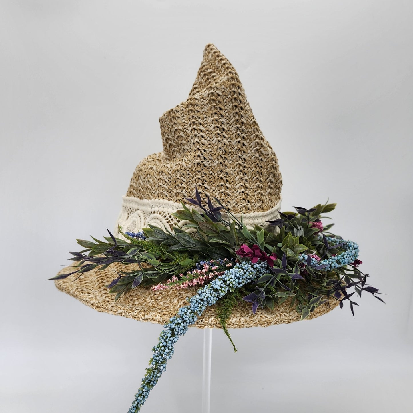 S208- Straw witch hat with floral decoration