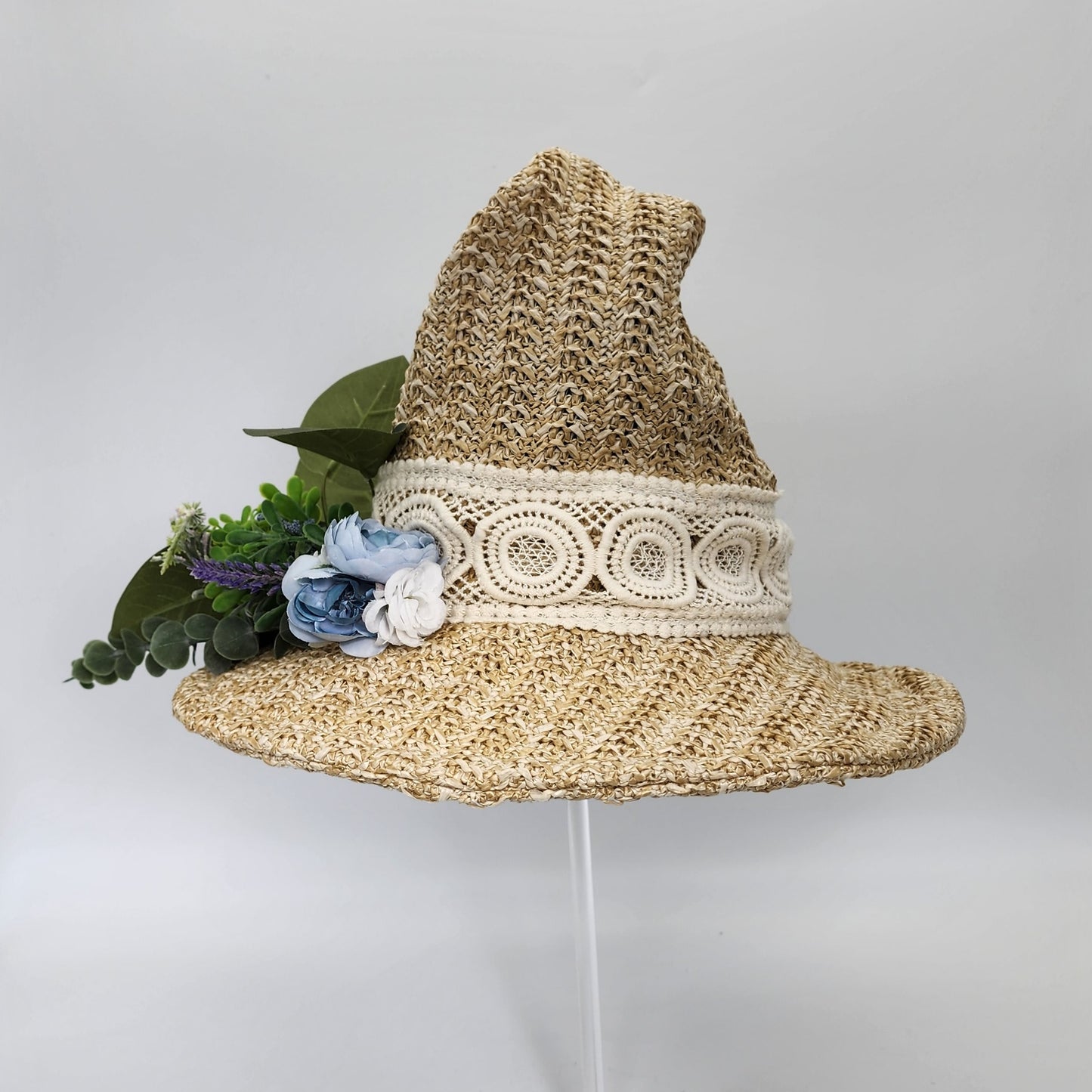 S209- Straw witch hat with floral decoration