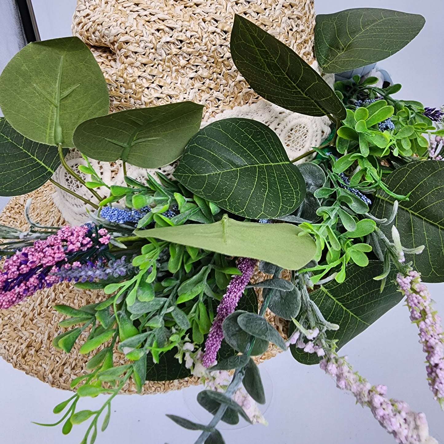 S209- Straw witch hat with floral decoration