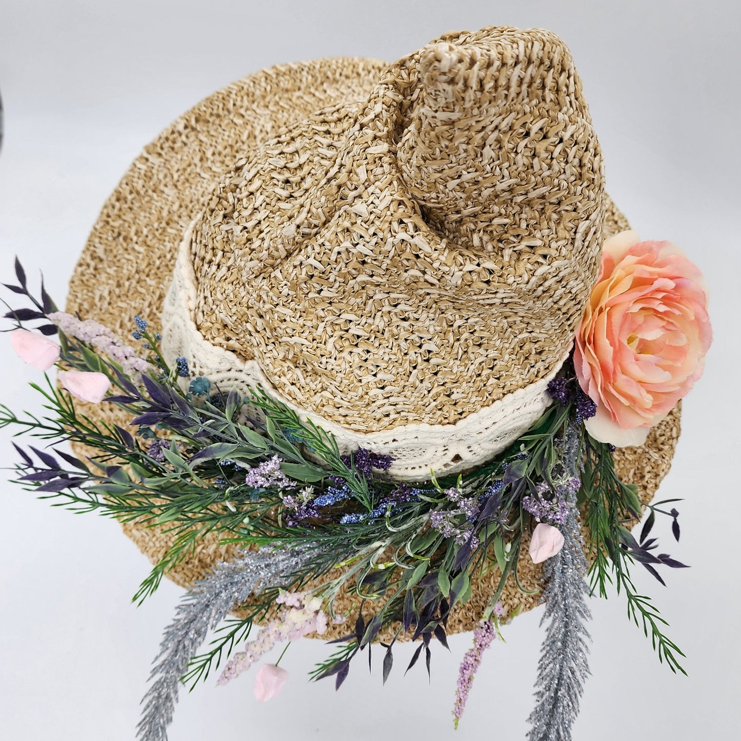 S207- Straw witch hat with floral decoration