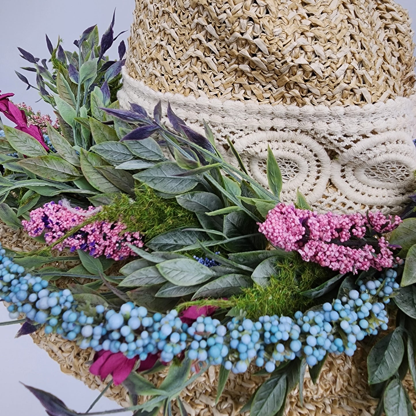 S208- Straw witch hat with floral decoration