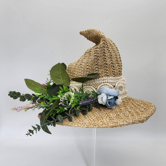 S209- Straw witch hat with floral decoration