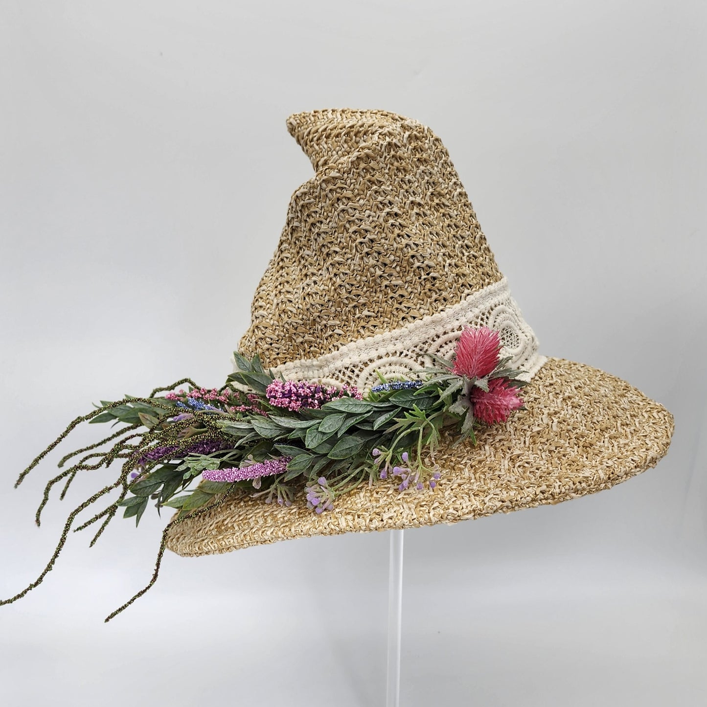 S210- Straw witch hat with floral decoration