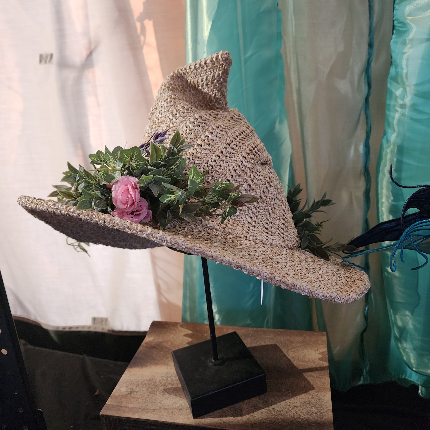 Straw witch hat with floral snake decoration